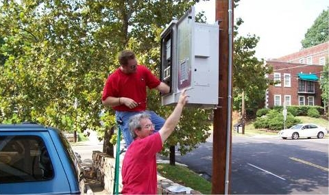 Purcell RAC35 pole-mounted enclosure bringing cable service to a residential area