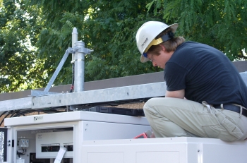 Purcell Systems technical field-expert assists with installation of network infrastructure